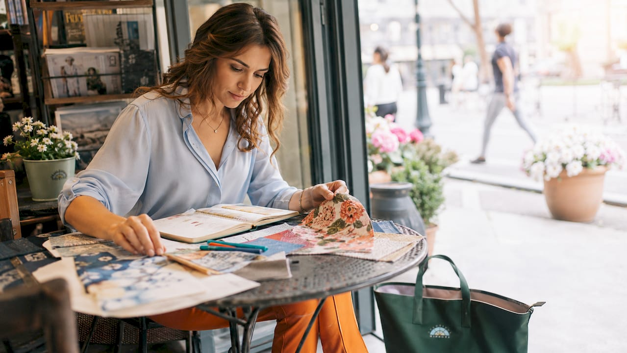 Interior designer reviewing fabric swatches