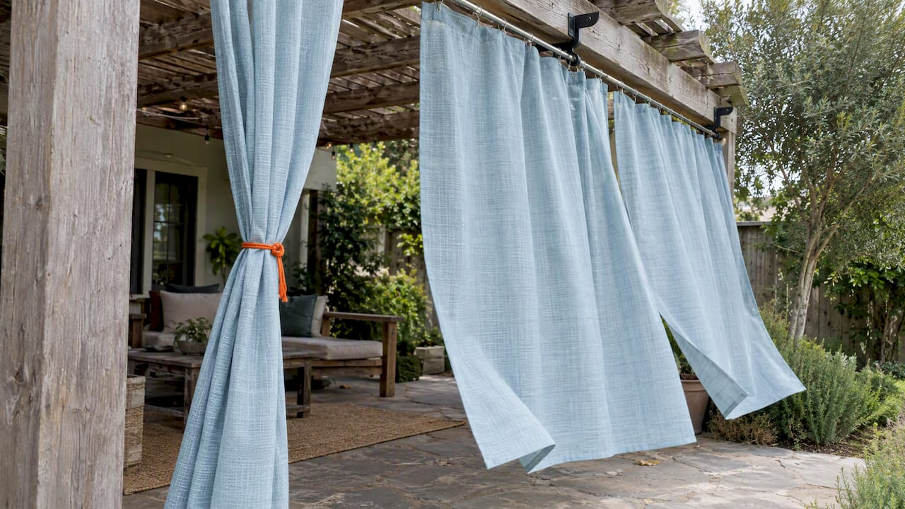 Outdoor Privacy Curtains: Fabrics, Hardware and Wind